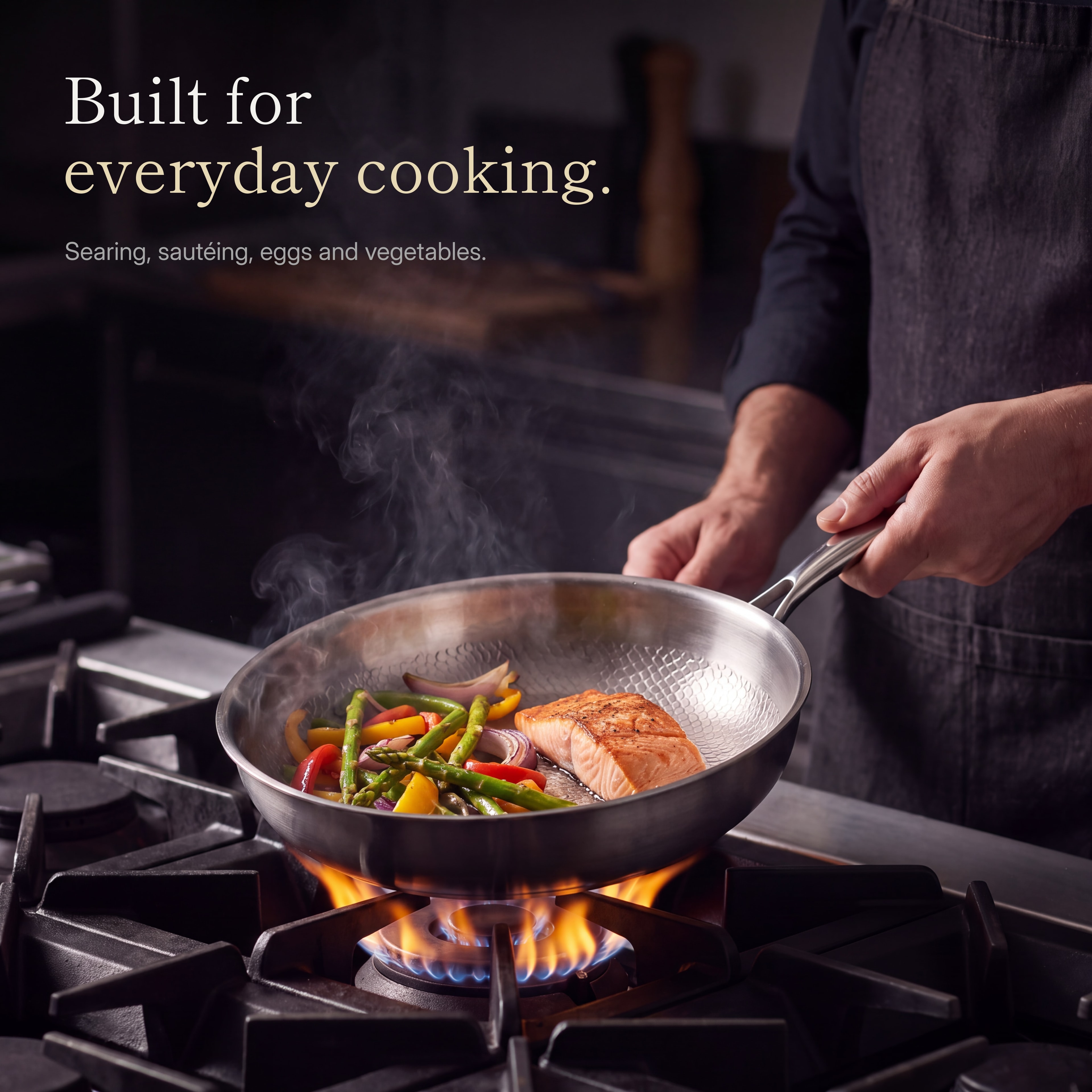 Built for everyday cooking: vegetables and salmon searing in the pan